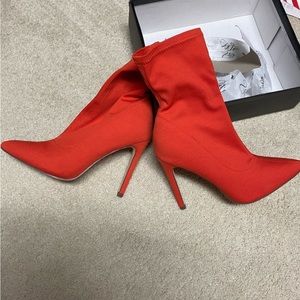 Red heeled boots Size 7.5 Worn ONcE.